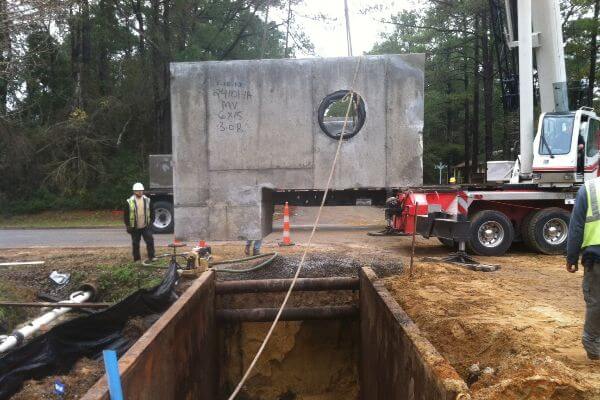 view of meter vault being set underground